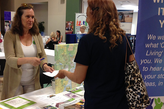 Jocelyn Geidt, facilitator in CLBC’s South Island CPD office, share information with guests at the Sidney Access Awareness Day Resource Fair.