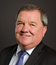 A portrait of CLBC Board Chair Shane Simpson.